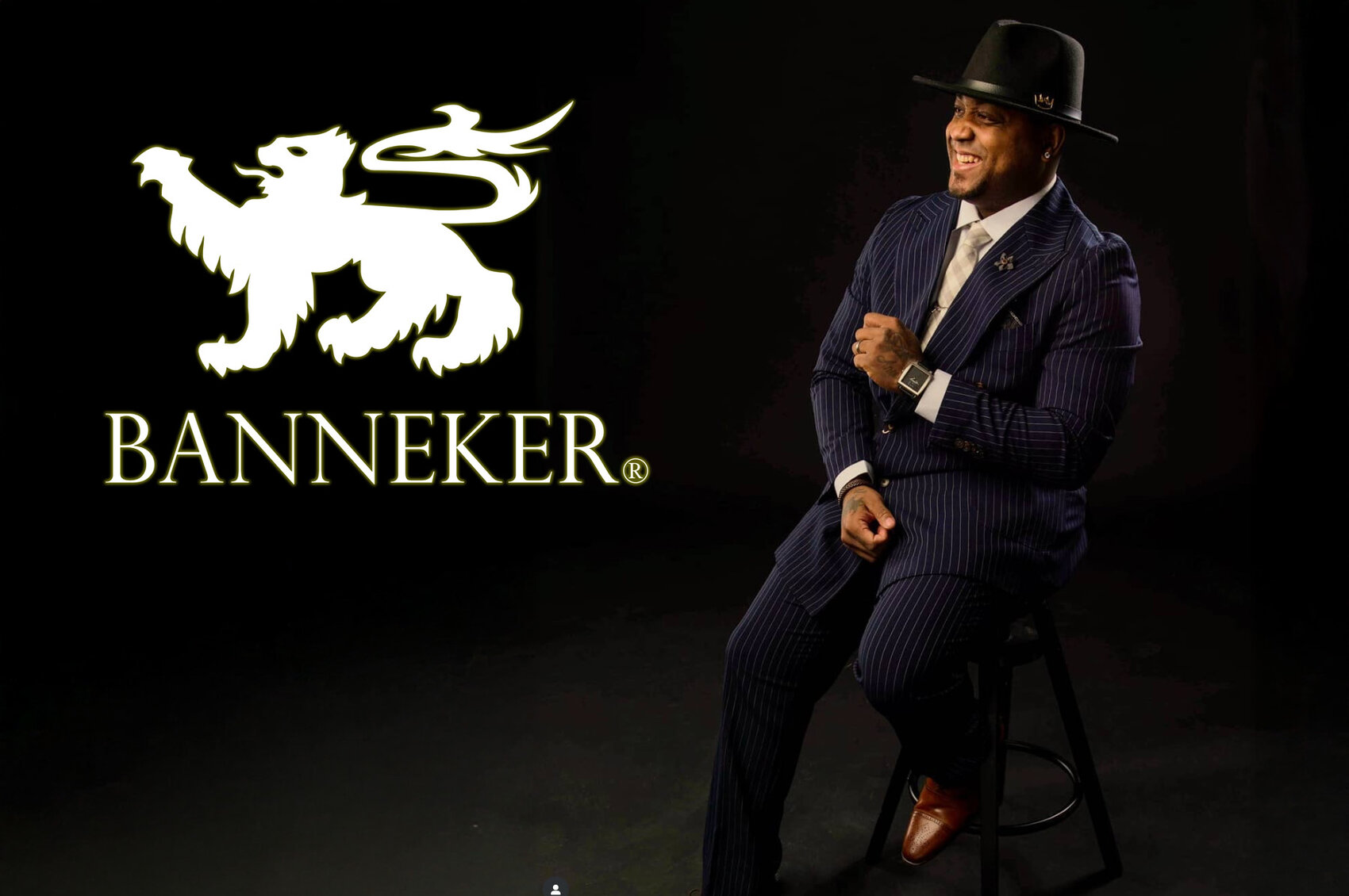 A man in a suit wearing a Banneker watch, beside the Banneker griffin logo created by i3